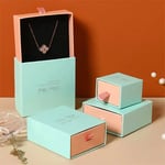 a bunch of blue and pink custom logo printed jewelry drawer boxes in different sizes