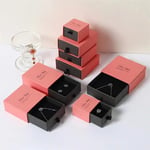 a bunch of red and black custom logo printed jewelry drawer boxes in different sizes