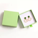 a green custom cardboard earring drawer box with a pair of earrings inside