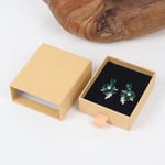 a kraft custom cardboard earring drawer box with a pair of earrings inside