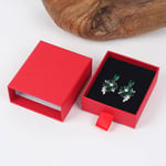 a red custom cardboard earring drawer box with a pair of earrings inside