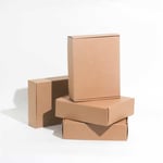 a bunch of custom kraft mailer boxes