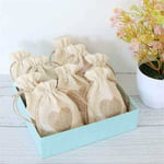 a bunch of custom linen gift pouches in a box