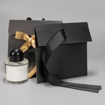 two black custom gift paper bags with flap, one of them is unfolded.