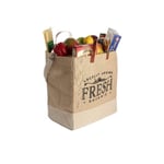 the custom jute grocery bag full of groceries