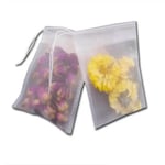 two custom non woven fabric tea bags with flower tea inside