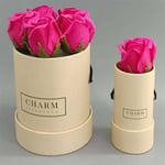 two cream colour custom flower gift tubes in different sizes