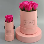 two pink custom flower gift tubes in different sizes