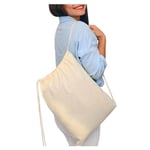 a big custom canvas drawstring bag carry on a woman&#039;s shoulder