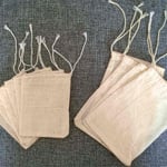 a bunch of custom cotton tea bags