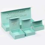 a bunch of cyan custom flip top magnetic jewelry packaging boxes in the open state