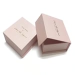 two pink custom flip top magnetic jewelry packaging boxes, one of them is closed and one is opened