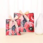 two red custom colorful gift paper bags with ribbon bow in different sizes