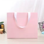 the front of the custom pink gift paper bag