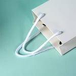 the rope handles of the custom reusable gift paper bag