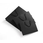 three custom black gift paper bags lay down together