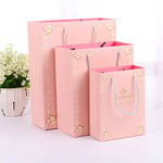 three pink custom matte lamination gift paper bags in different sizes