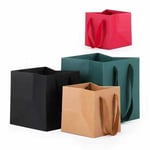 four custom square kraft paper bags with rope handles in different colours and sizes