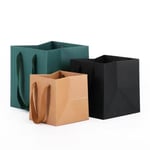 three custom square kraft paper bags with rope handles in different sizes and colours