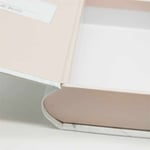 the detail of the custom luxury white book shaped magnetic box