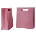 the side and front of the custom pink paper bag with die-cut handles