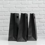 the side of the custom black paper bags with die-cut handles