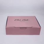 the front of the custom color printed roll end tuck top box