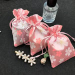 three pink Custom Satin Drawstring Pouches