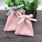 two pink Custom Velvet Ribbon Pouches in different colours